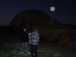 The second balloon being inflated under the late setting moon.